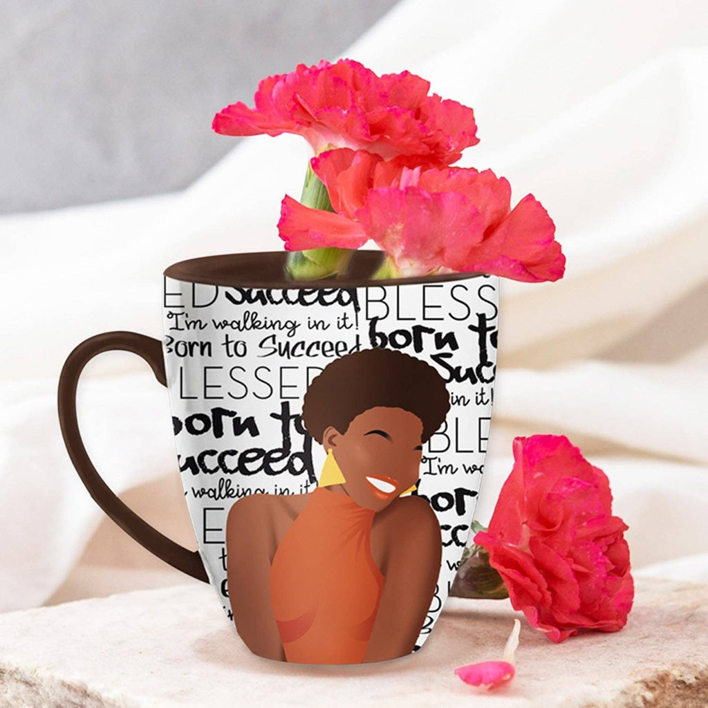 Keepsake lane ceramic coffee mug featuring an inspirational illustration of a woman with Born to Succeed typography.