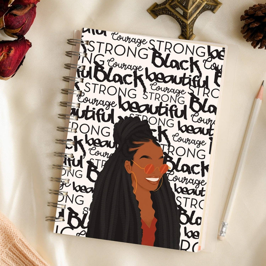 Keepsake lane spiral bound journal featuring an illustration of a woman with braided hair and empowering typography.